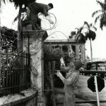 U.S. soldiers surround Iolani Palace with barbed wire during the rule of martial law in 1942.