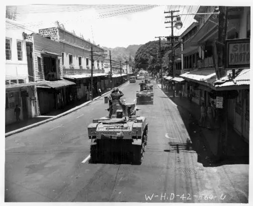 US Army M3 Stuart light tanks in maneuvers, Beretania Street in the Honolulu business district, Hawaii, 30 August 1942.