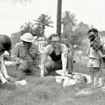 Volunteers conduct a poison-gas drill in Honolulu. Everyone over age 7 in Hawaii was issued a gas mask after the Dec. 7, 1941 attack. Courtesy: Desoto Brown Collection